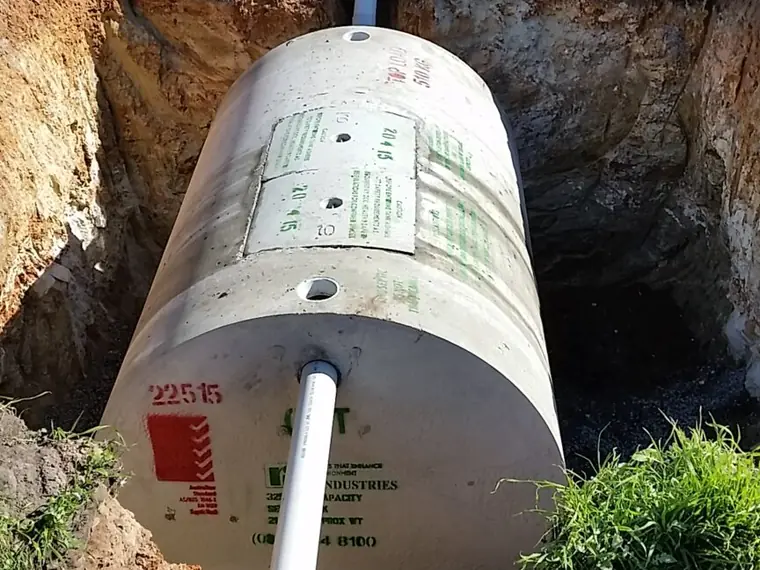 Stormwater detention tank lowered into an excavated trench